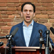 Louisville Democratic mayoral candidate Craig Greenberg speaks during a news conference in Louisville, Ky., Monday, Feb. 14, 2022. Greenberg was shot at Monday morning at a campaign office but was not struck, though a bullet grazed a piece of his clothing, police said.